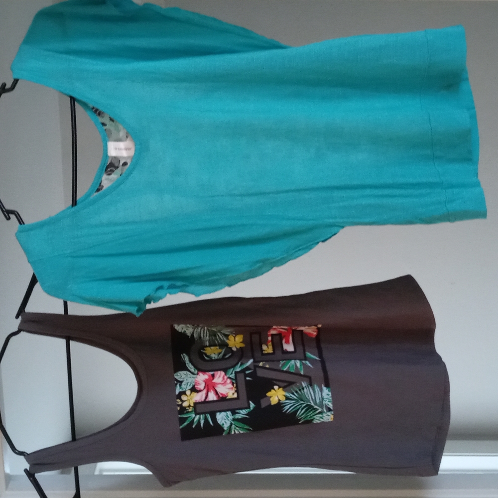 2 very nice shirts womens size S they go in a bundel togather